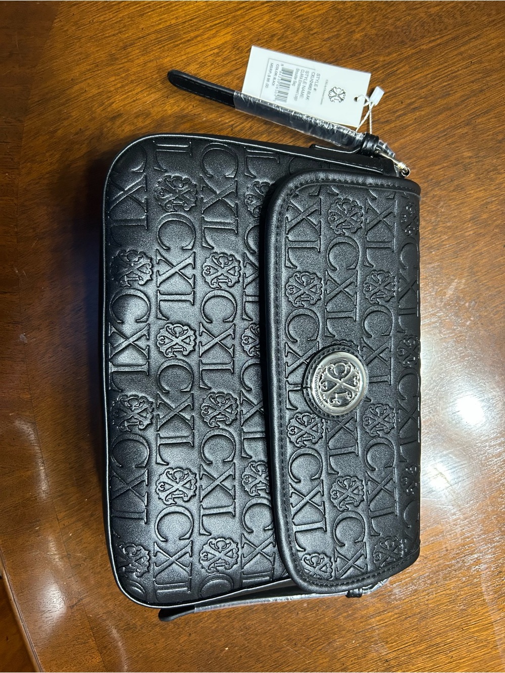 Christian Lacroix Black Embossed purse with shoulder strap